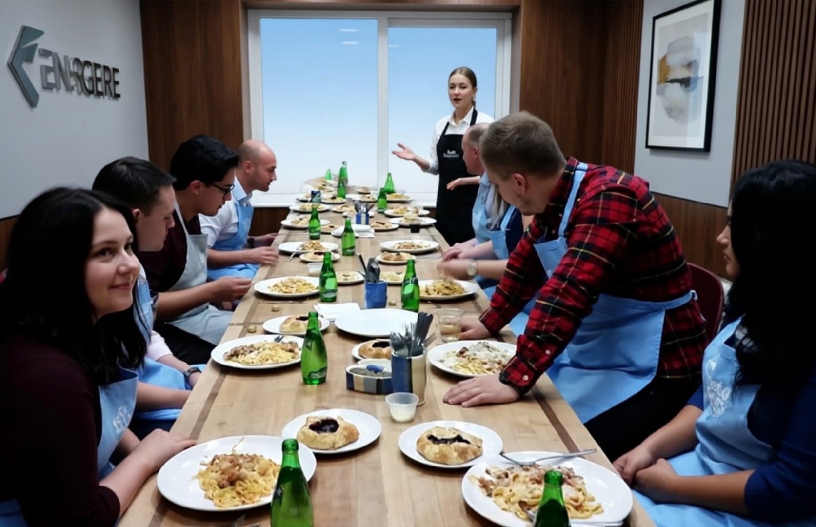Team gathered around a finished plate